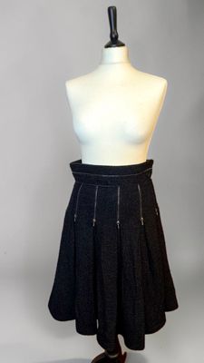 an image of a mannequin with a skirt on a mannequin stand