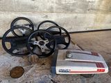 a toy car and steering wheel sitting on a table