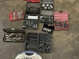 many tools that are laying out on the floor