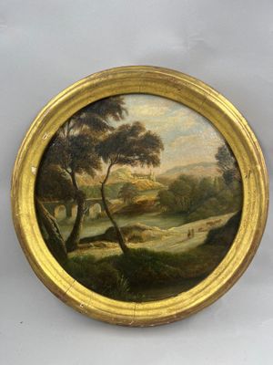 une image d'un tableau représentant un paysage dans un cadre doré