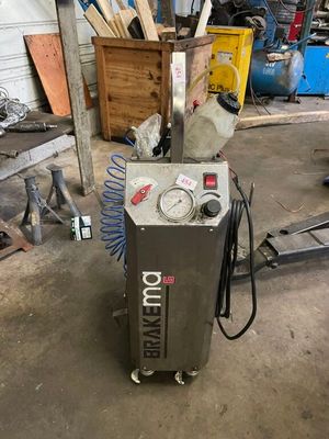 an image of a machine that is in a garage