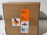 a cardboard box with a pair of scissors on it