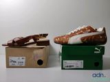 deux chaussures posées sur une boîte