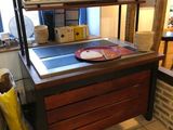 a kitchen with a sink and a counter in it