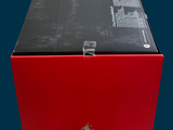 a red box that has a black apple logo on it