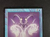 an image of a card with a picture of a demon