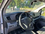 the interior of a car with a steering wheel and dashboard