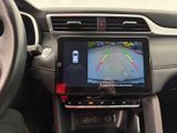 an image of a car ' s dashboard with a camera mounted on the dash