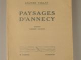the cover of the book paysages d ' annecy is shown on a table