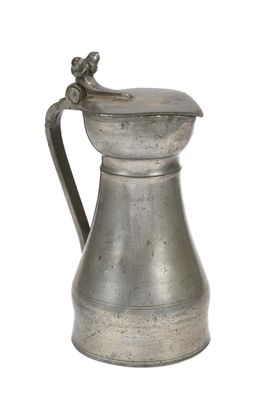 an old silver pitcher with a handle on a white background