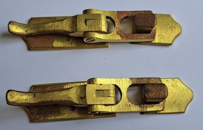 Paire de FERMETURES pour capote de landau, neufs, brut d'usi…