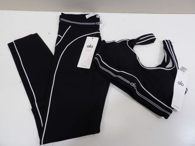 a close up of a pair of leggings and a bra top