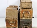 four wooden boxes stacked on top of each other