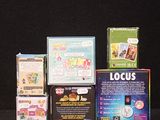 many different types of games on display on a black surface
