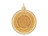 l'image d'une pièce d'or de forme circulaire