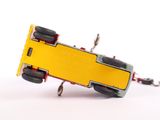 a toy truck that is upside down on its side