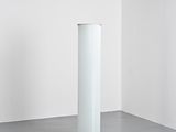 an image of a white lamp sitting on top of a floor next to a white wall