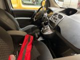 a red bag sitting in the passenger seat of a car