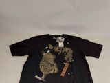 an old black t - shirt with a picture of a cat and a dog on it