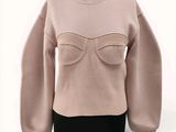 an image of a woman ' s sweater on a mannequin mannequin