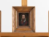 la photo d'un homme barbu dans un cadre