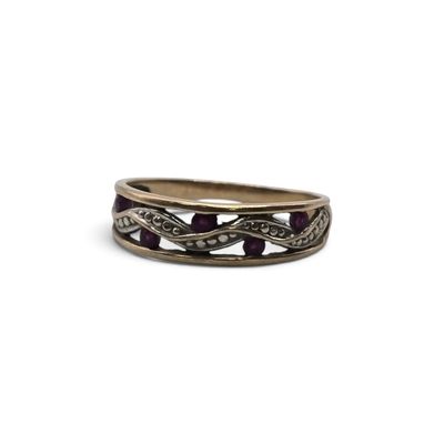 a close up of a ring on a white background