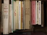 many books that are sitting in a box together