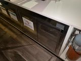 an image of a kitchen with a sink and a dishwasher