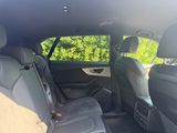 the back seats of a car are empty with no people in it