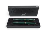 a green pen in a black box with a gold trim