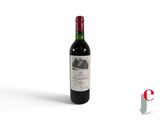 a bottle of wine that is sitting on a table
