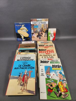 a group of books sitting on top of a table next to each other