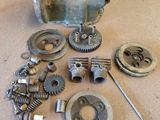 many different types of gears and parts on the table