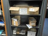 many boxes and boxes on the shelves in the room