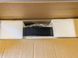 an open cardboard box containing a pair of socks and a pair of socks