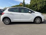 a picture of a white car parked in a parking lot