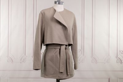 an image of a dress and jacket on a mannequin