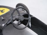 an image of a toy car with a steering and steering wheel