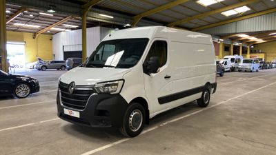 a white van that is parked in a parking lot
