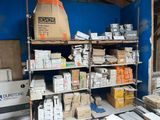 many boxes and boxes on the shelves in the room