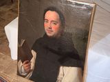 a picture of a man holding a book on the floor