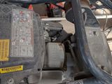 an image of a motorcycle that is sitting in a garage