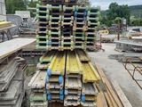 a large pile of lumber stacked on top of each other