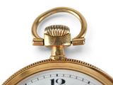 a close up of a gold pocket watch on a white background