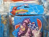 many bags of toys on the table in the store