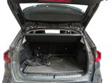 a trunk of a car with luggage in the trunk
