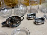 a table with a lot of glass items on it