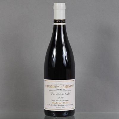 a bottle of wine that is sitting on a table