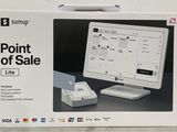 le carton de l'ordinateur est ouvert sur la table