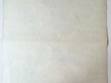 an image of a piece of paper on a white surface
